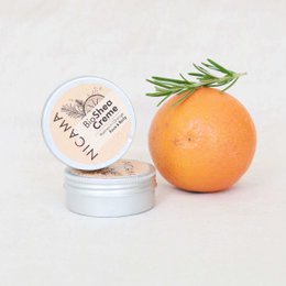 Organic shea cream rosemary orange natural skincare moisturizer jar white container