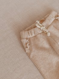 Pantaloni sportivi / volant da ragazza - Crema