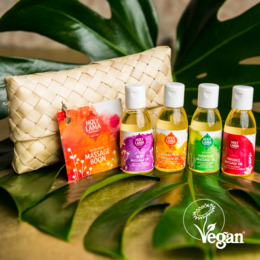 Ayurvedic massage oil gift set, natural and vegan, travel-size. Includes various scented oils in a woven basket.