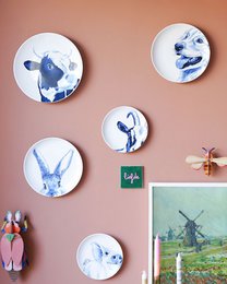 Wandbord Koe