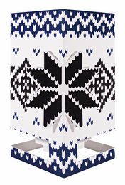 A blue, white, and black knitted candle holder with a snowflake pattern, suitable for Christmas decor.