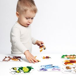 Colorful baby animal puzzle with various shapes and textures for young children to explore and learn.
