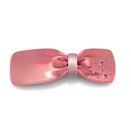 Pink acrylic and crystal hair barrette with a bow and rhinestone accents.