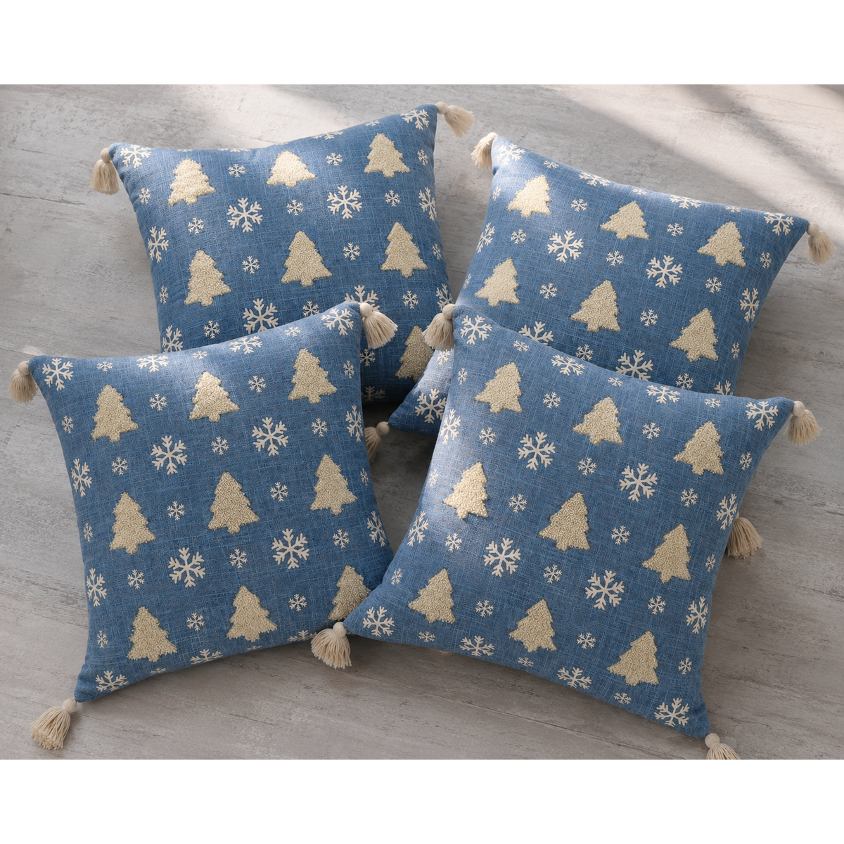 Pack de 4 fundas de cojín navideño – Árboles nevados azules