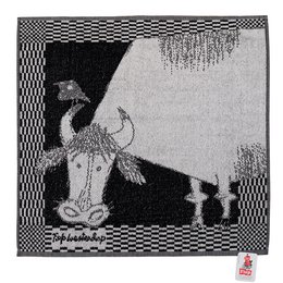 Kitchen towel with a cow design, featuring a black and white checkered pattern and a stylized cow illustration.