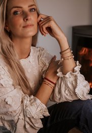 gold bracelet with red