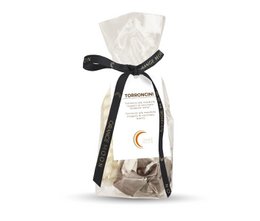  A rectangular white gift bag containing assorted Italian nougat candies, tied with a black ribbon.