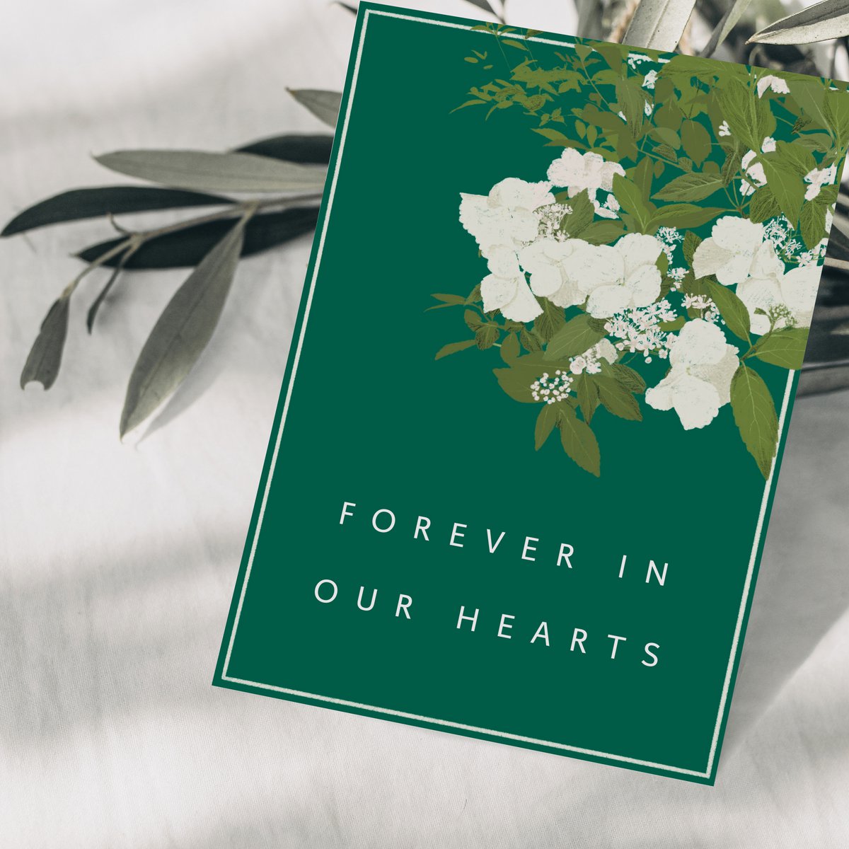 Mourning card 'forever in our hearts' with white flowers