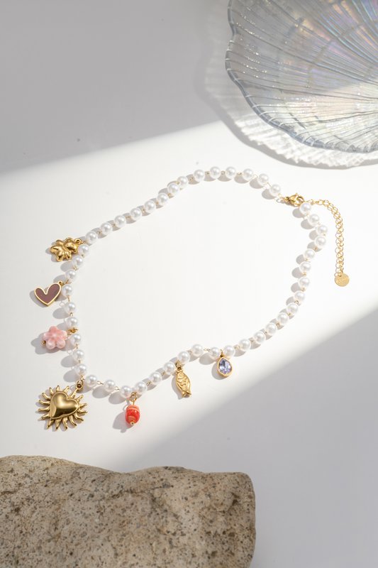 Roestvrijstalen parels en charmes ketting