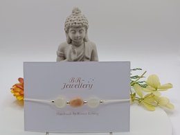 Moonstone gemstone bracelet with macrame design, available in various metal finishes including silver, gold, and rose gold.