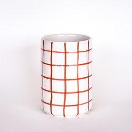  Cylindrical cotto orange grid pattern vase, white ceramic with red geometric lines, modern minimalist design.