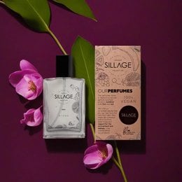 Vegan Eau de Parfum - Otono, a perfume from the Sillage brand. The perfume bottle is made of glass with a simple, minimalist design. The packaging features an earthy, natural aesthetic with a brown and green color scheme, suggesting a natural, eco-friendly product.