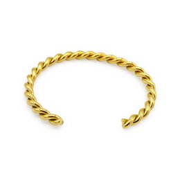 The CORAZUL "PRINCESS" BRACELET is a charm bracelet made of a twisted gold-colored metal chain. The bracelet has a delicate, feminine appearance and would be suitable for casual or dressy occasions.