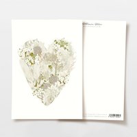 Postcard heart made of cream-colored flowers