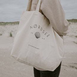  Cotton shoulder bag with "Nordsee" logo and graphic design, made of durable natural material.