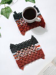  Black and rust braided textured cotton coasters, 2-piece set, woven pattern design