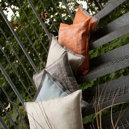 Linen pillowcase in a warm rosewood color, featuring a soft, natural texture and a simple, elegant design. Suitable for use in a variety of home decor styles.