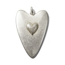 Silver heart-shaped pendant with a shiny finish and a heart-shaped design. Suitable for use as an amulet or necklace charm.