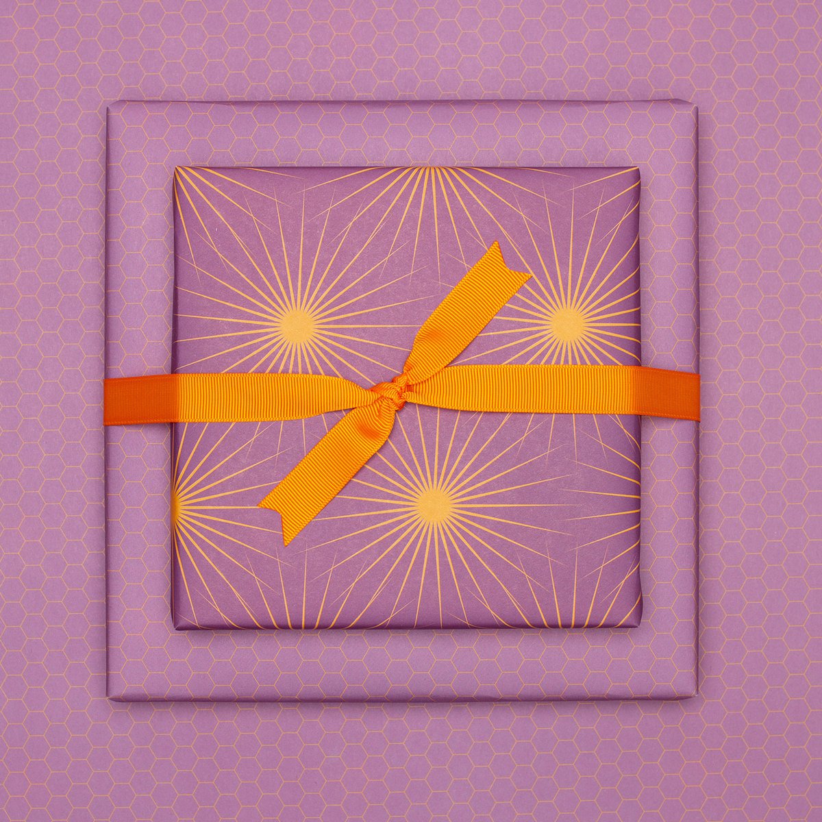 Lila Geschenkpapier mit Sonnensternen, retro Geschenkpapier orange und lila, ideal als Geburtstags- Geschenkpapier Frühling oder Weihnachtsgeschenkpapier