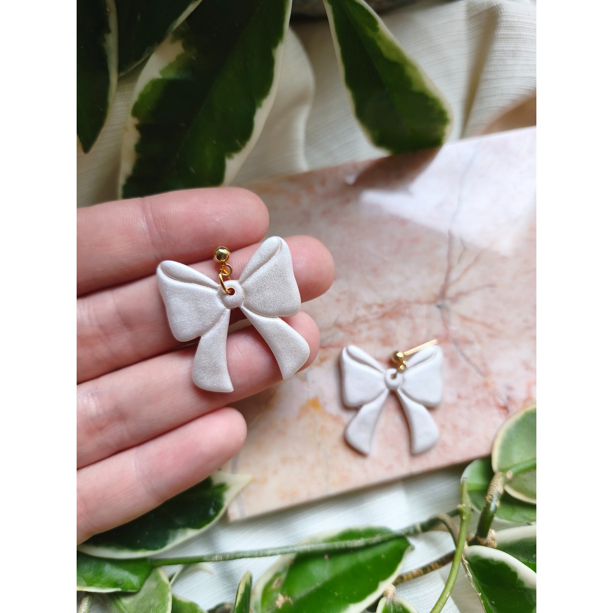 Boucles d'oreilles noeud nacre