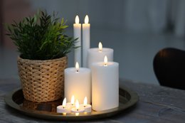 White LED candles, battery-operated, remote control, flameless, home decor, ambient lighting.