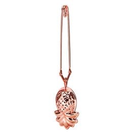 Rose gold tea tongs with pineapple-shaped infuser, ideal for steeping loose leaf tea.