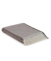  Soft, warm merino/cashmere throw in a neutral brown color. Features a fringed edge for a cozy, textured look. Ideal for adding warmth and style to any living space.