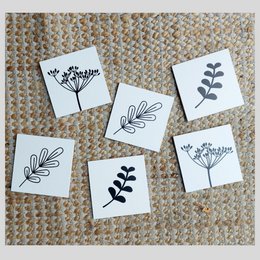 Coasters sort/hvid blomst/plante