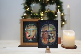 Play Christmas card game by the window