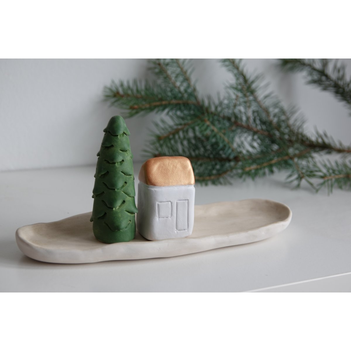 Christmas Giftbox with house, tree and candle