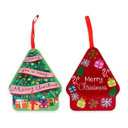 Red green Christmas tree shaped tin ornament with "Merry Christmas" text, gifts, snowflakes, festive holiday decoration.