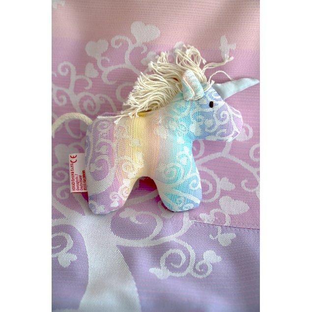 Clutching toy unicorn Marie in Wonderland
