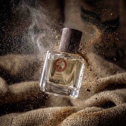 Tumbao Cuba Eau de Parfum is a perfume product with a 50 mL bottle, an 11 mL travel case, and a 200 mL refill option. The perfume has a distinctive glass bottle design with a red logo.