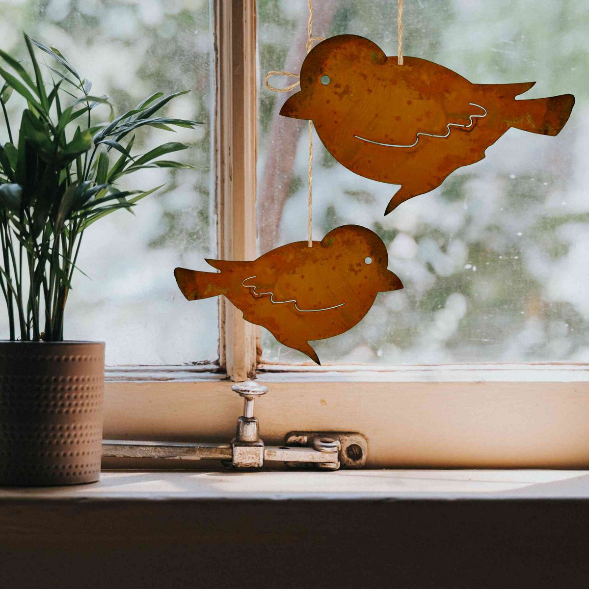 Metal decorative bird for hanging or on a stick Rust decoration for the garden and living room