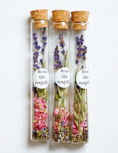 Dried flowers flower seeds in a bottle with sticker