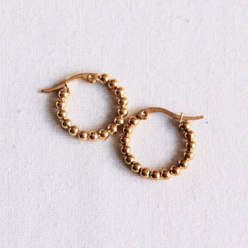 EA504.2: Criolla de acero inoxidable 20mm “bolas” – oro