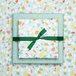 Colorful wrapping paper turquoise with terrazzo pattern, children pack gifts for children's birthday, for school or at birth
