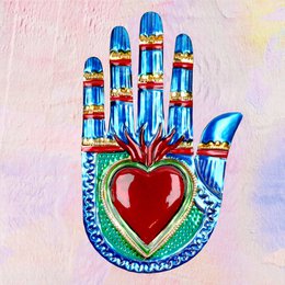 Colorful, intricate hand-shaped relief image with a heart motif, featuring a variety of vibrant colors and patterns.