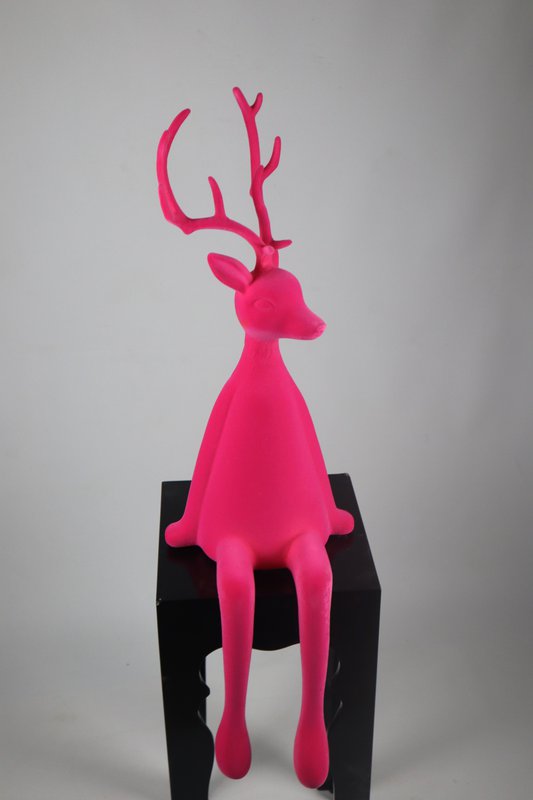 Reindeer sitting pink flock plastic. 93cm PU:2