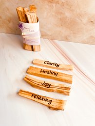 Palo Santo incense sticks, natural wooden sticks with a floral accent, ideal for meditation and relaxation.