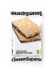 Chocolate sesame squares, a snack bar with a chocolate and sesame seed filling, featuring a playful superhero-themed packaging design.