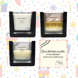 Scented candle with "Thank you" and "I always just envie" text in a glass container with a black frame.