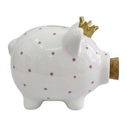 White ceramic pig piggy bank with pink polka dots and gold crown, savings box.