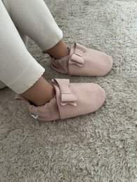 Pink baby shoes with bow detail and gripwalk sole, suitable for ages 6 months to 3 years.