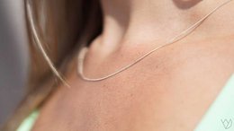  Sleeveless necklace tank in silver and gold colors, featuring a delicate chain necklace design.