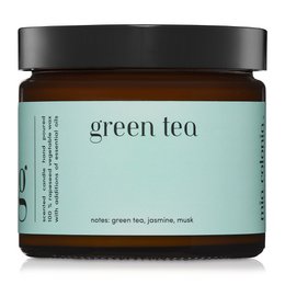 A 100% natural green tea scented candle made with rapeseed wax. The candle has a tall, round shape and a green color.