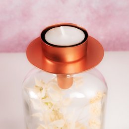 Rosé tea light holder, round, metallic copper color, glass container, suitable for tea light candles.