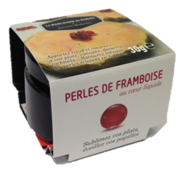 Raspberry pearls, a 30g seasoning product in a square container with a label indicating the product name and contents.