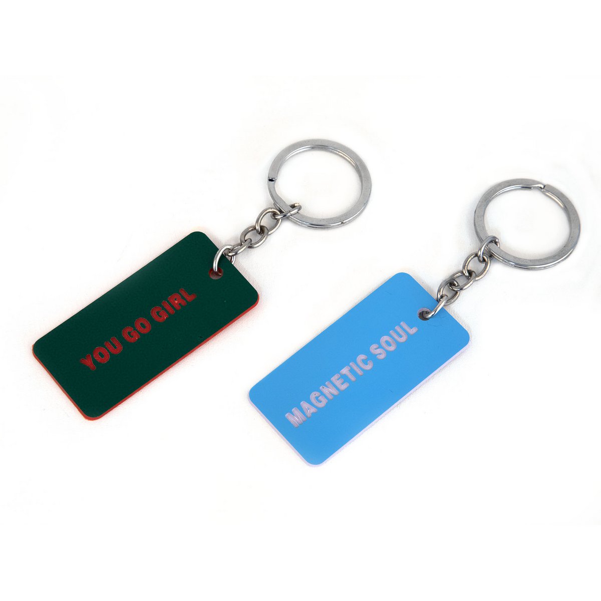 2 GROENE EN BLAUWE BADGE SLEUTELHANGERS HF