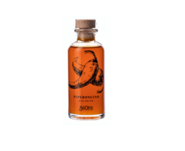Organic dressing with extra virgin olive oil and chili pepper, 100 ml bottle. Vibrant orange color, glass bottle with wooden cap.